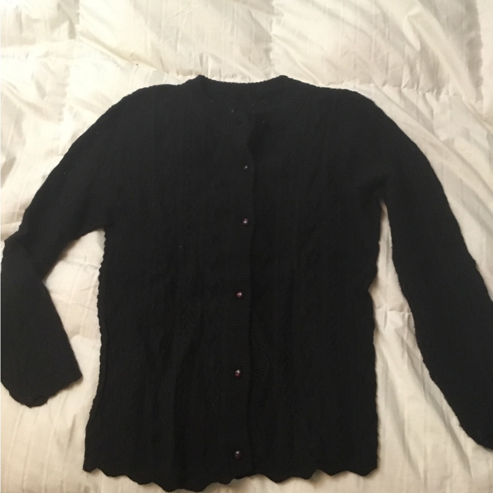 Woman’s Black six button cardigan sweater
